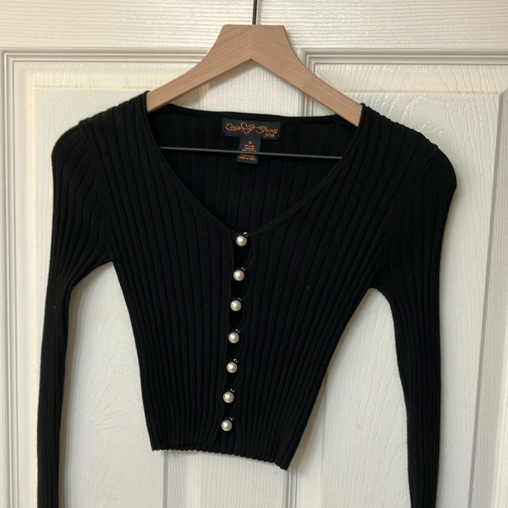 Black long sleeve with pearl buttons